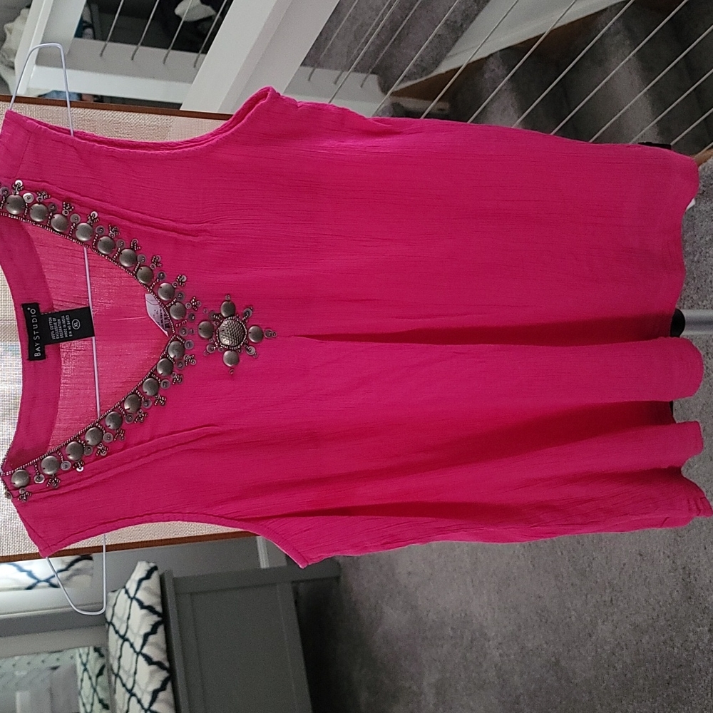 Pink top with medal accents